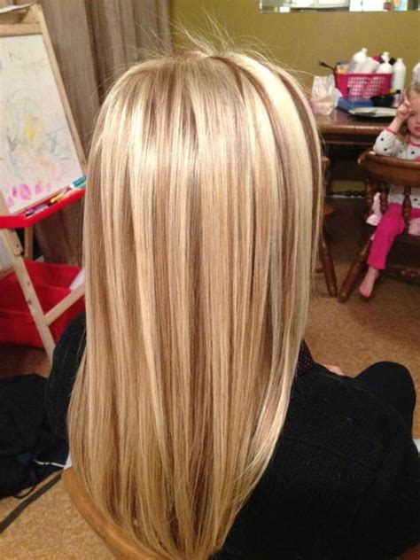 A platinum blonde highlight with red lowlights. New Best Blonde Hairstyle Ideas With Lowlights