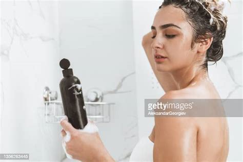 woman gym shower photos and premium high res pictures getty images