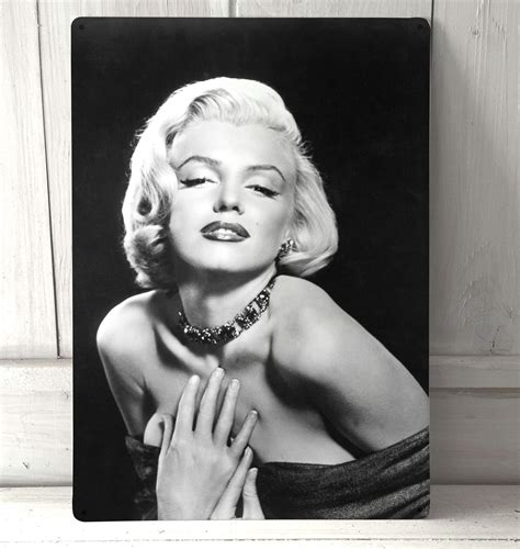 Marilyn monroe was an american actress, comedienne, singer, and model. Marilyn Monroe Pose Vintage Sign