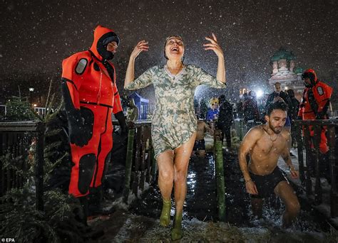 Brave Orthodox Christians Plunge Into Icy Water For Epiphany