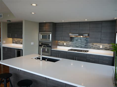 Modern kitchen cabinets can be an eclectic mix of old and new. Seattle Condo Modern Kitchen Reface