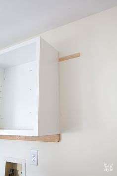 When this old house contractor tom silva started his carpentry career over 35 years ago, he often built the kitchen cabinets he installed for his customers. How to hang a wall cabinet the easy way -- A Pinch of Joy ...