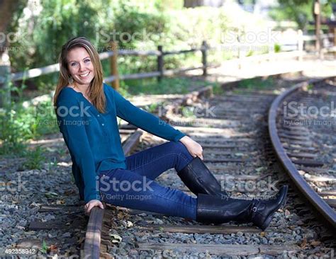 Beautiful Young Woman On Train Tracks Portrait Stock Photo Download