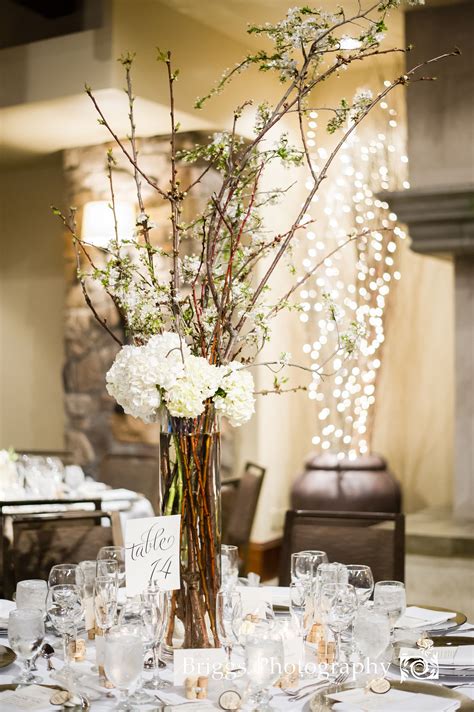 Tall Branches With White Blossoms With Hydrangeas Wedding Table
