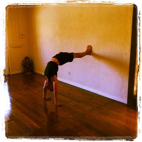 Hollow Back Backbend At The Wall Variation With Legs