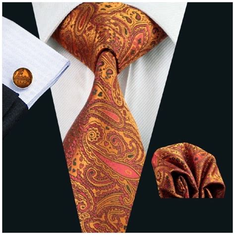 Burnt Orange Paisley Silk Tie With Matching Pocket Square And Cufflink