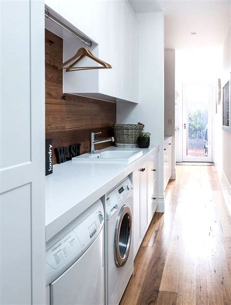 In the middle of the night, you hear a ding come from the laundry room. Style Guide: Modern Laundry Room Ideas and Storage Tips ...