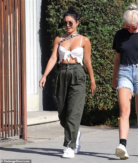 Vanessa Hudgens Shows Off Her Toned Tummy While Standing Tall In