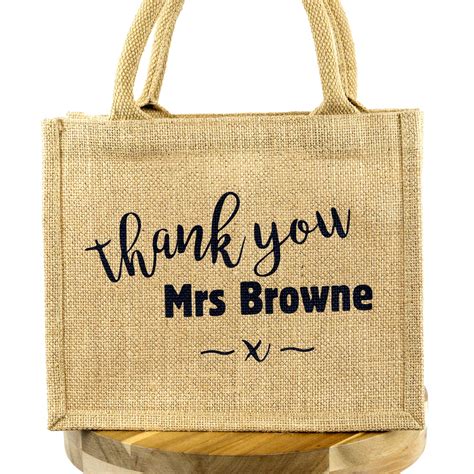 You can't go wrong with a potted succulent and a scented candle. Personalised thank you gift bag | Personalied teacher gift ...