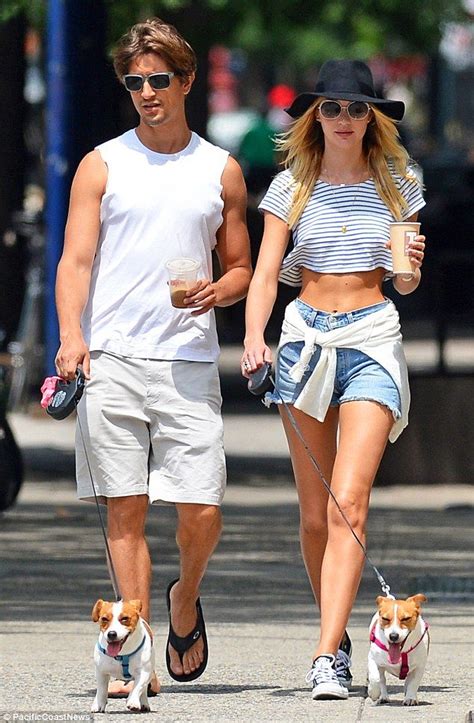 Candice Swanepoel Shows Midriff With Boyfriend Hermann Nicoli And Dogs