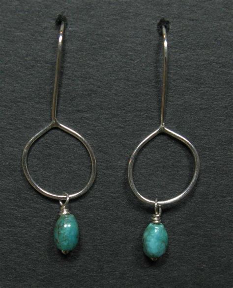 Turquoise Drop Earrings In Hand Formed Silver