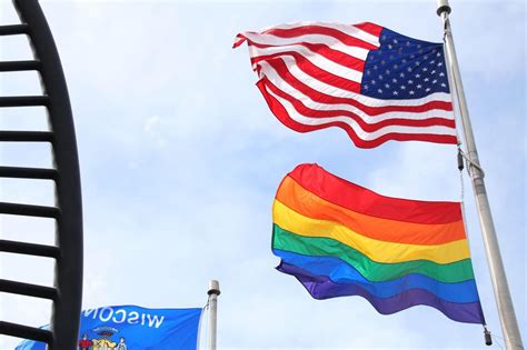 Uw Madison Raising Pride Flags Over Memorial Union Union South