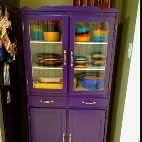 A china cabinet is a piece of dining room furniture, usually with glass fronts and sides, used to hold and display porcelain dinnerware (china). Boring brown china cabinet into spicy purple to go with my ...