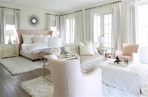 Pink And Gray Bedroom Sitting Area Is Filled With A Light