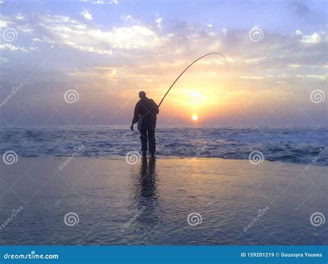 Fisherman Fishing At Sunset Stock Image Image Of Sunset Silhouette