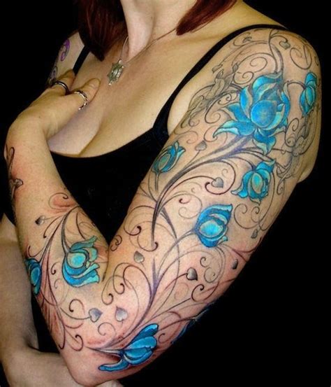 40 Insanely Gorgeous Blue Tattoos In Trend Sleeve Tattoos Full Arm Tattoos Blue Flower Tattoos