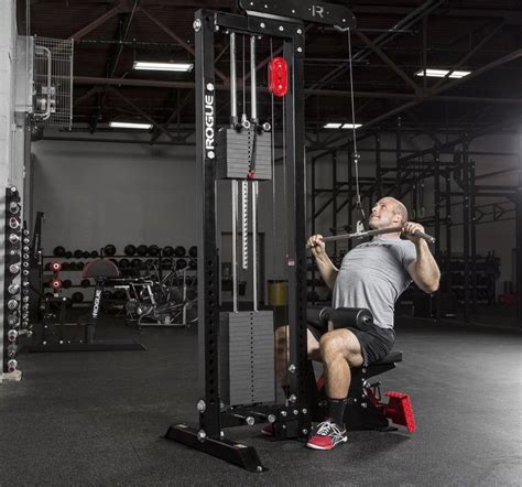 This is an extremely portable diy rowing machine. Rogue stand alone lat machine w/ resistance band pegs ...