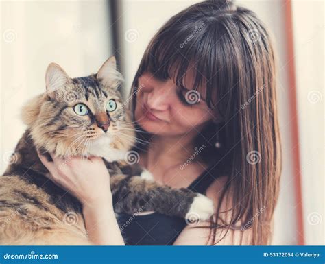 Beautiful Smiling Brunette Girl And Her Ginger Cat Stock Photo Image