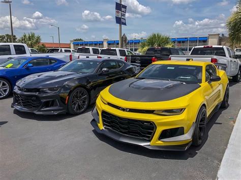 Chevrolet Camaro Zl1 Painted In Black And A Chevrolet Camaro Zl1 1le