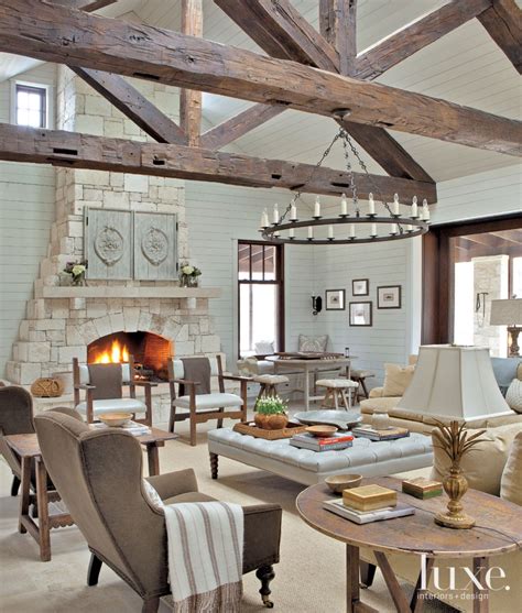 Neutral Transitional Living Room With Stone Fireplace Luxe Interiors