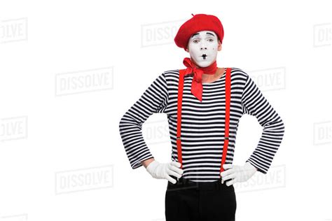 Surprised Mime Standing With Hands Akimbo Isolated On White Stock
