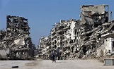 Attacks on Security in Syria’s Homs Kill Dozens - WSJ