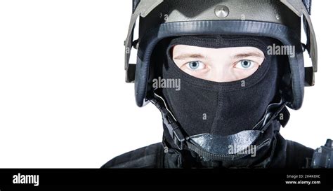 Russian Special Forces Operator In Black Uniform And Bulletproof Helmet