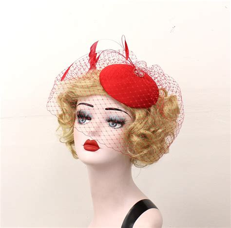 red hat red birdcage veil feather fascinator pin up head etsy