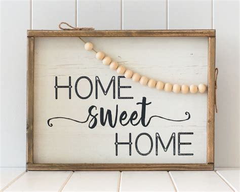 A simple unit can be enough storage for a limited space or the foundation for a larger storage solution if your needs change. Timber Quote Box/Wall Art - Home Sweet Home - 40x30