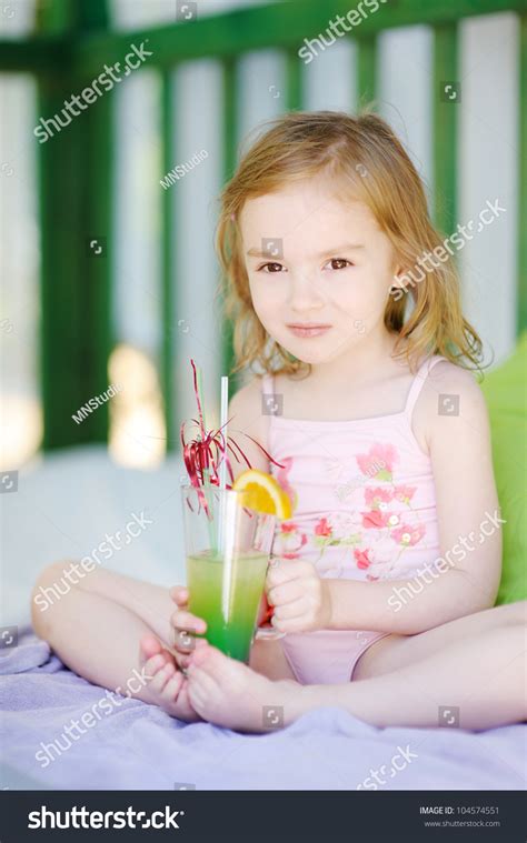 Download the perfect shutterstock pictures. Cute Little Girl Swimsuit Drinking Cocktail Stock Photo ...