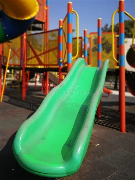 Green Slide In The Playground Stock Image Image Of Color Concept