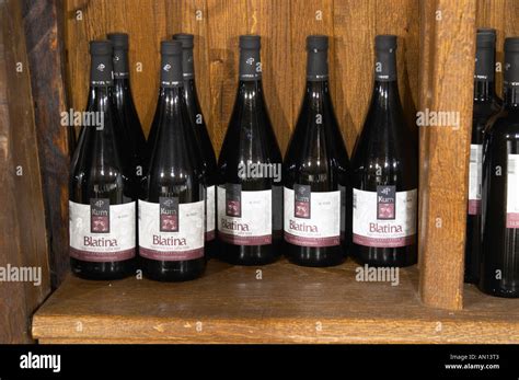 Bottles Of Kum Blatina On A Shelf In The Wine Shop Hercegovina Produkt