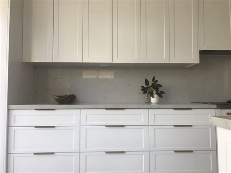 Our ice white shaker kitchen cabinets are the perfect choice! White shaker style cabinets with brushed brass lip pull ...