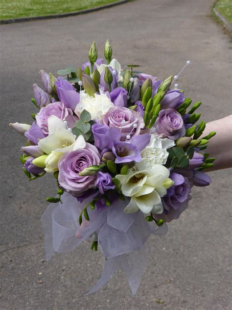 Tied Bouquet Lilac Lisianthus And Freesias White Carnations And