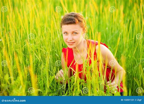 Young Beautiful Girl Sits On Meadow Stock Image Image Of Happiness