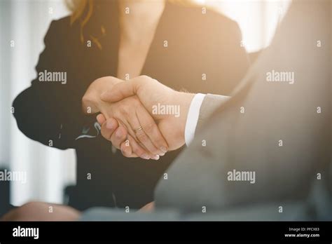 Business People Shaking Hands With Business Deals Stock Photo Alamy