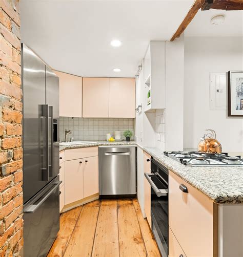 Brick and beams abound at this $1.75M Brooklyn Heights three-bedroom