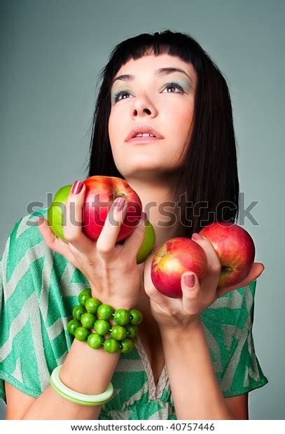 Young Brunette Seductive Woman Holding Apple Stock Photo 40757446