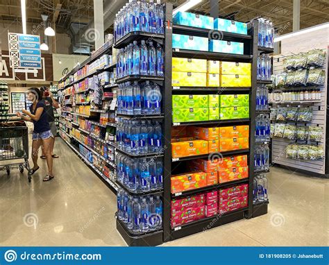 Prices and availability are subject to change without notice. A Display Of Water Bottle Aisle At A Whole Foods Market ...