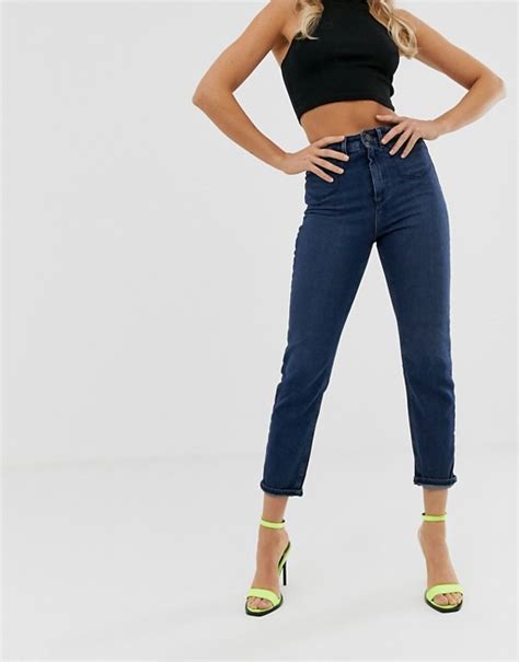 asos design recycled farleigh high waisted slim mom jeans in dark wash blue with front patch
