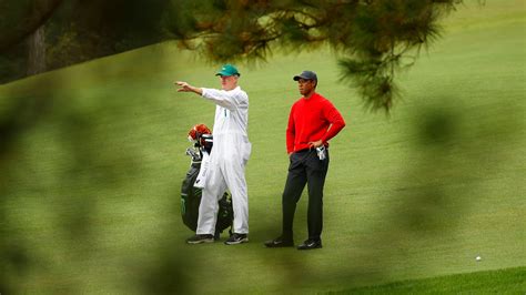 Masters Champion Tiger Woods And Caddie Joe Lacava Wait Before Hitting