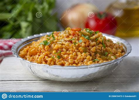 Traditional Turkish Bulgur Pilaf With Tomato Sause In Plate Turkish