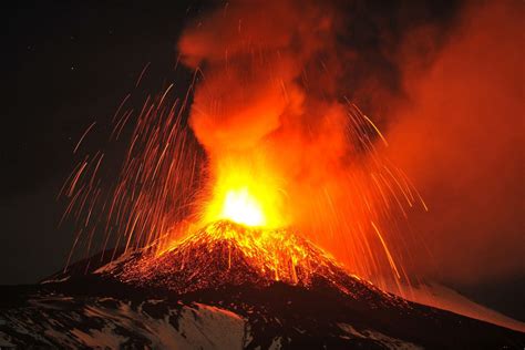 Its base has a circumference of about. Mount Etna volcano in Italy erupts, lighting up the nighttime sky | Toronto Star