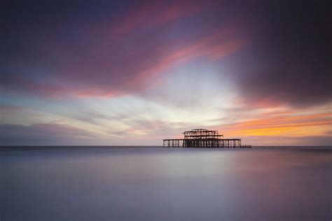Sunset Over Brighton West Pier Photograph By Paul Daniels Fine Art
