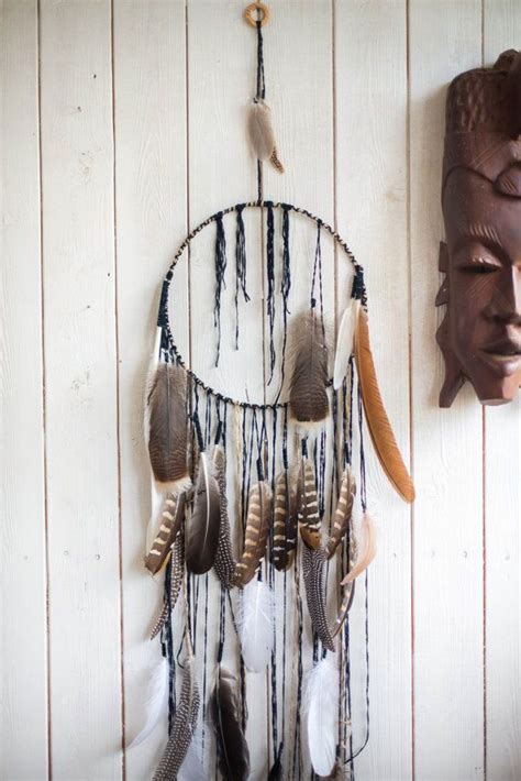 Believed to provide restful sleep by capturing dreams, the dream catcher would snare the bad dreams in its web while allowing the good ones to flow through the feathers into the sleeping person. Dreamcatcher wall hanging Dreamcatcher Dream catcher ...