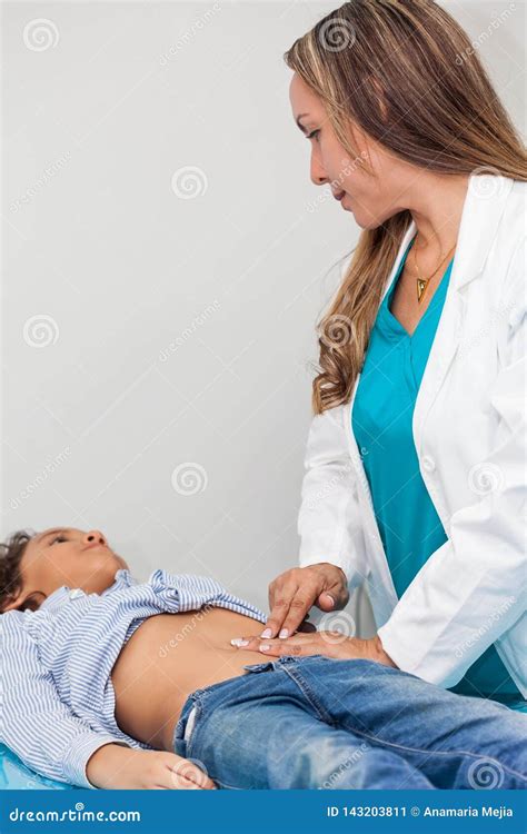 Doctor Examining And Performing The Technique Of Abdominal Percussion