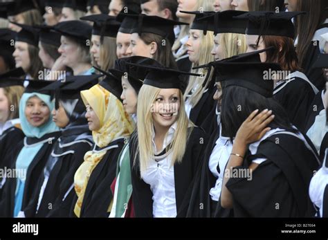 University Students At Their Graduation Ceremony Wearing Their Mortar