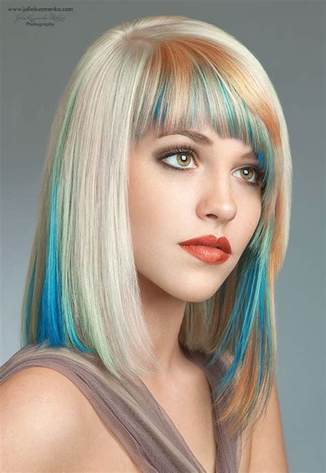 Experts recommend that to dye black hair blue, you must first lighten it to a blonder hue. Hair streaks | Hair color blue, Blonde hair with highlights