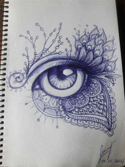 Pen Drawing Of A Female Eye With Mandala Drawing Around It On White