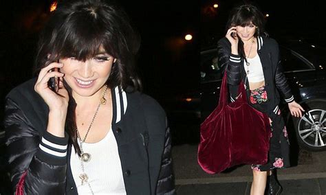 daisy lowe flashes her taut stomach in a crop top and floral skirt daisy lowe bounty stomach